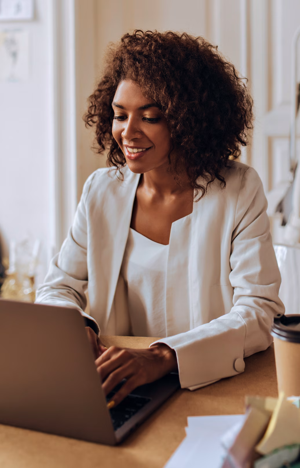 home, Woman at laptop, manufactured homes, MHP Communities, financing, mhp