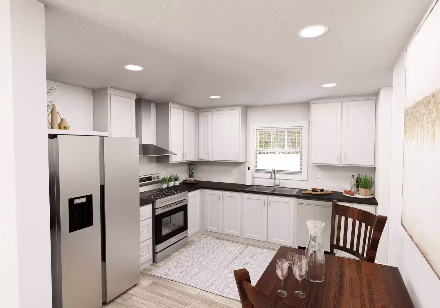 Modern kitchen with white cabinets, black countertops, stainless appliances, and wooden dining table